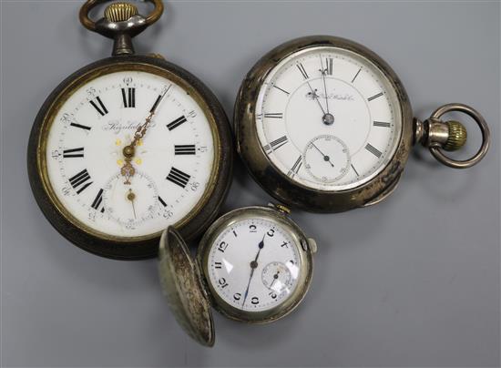 Two pocket watches including Elgin and a gun metal regulator and a novelty golf ball fob watch.